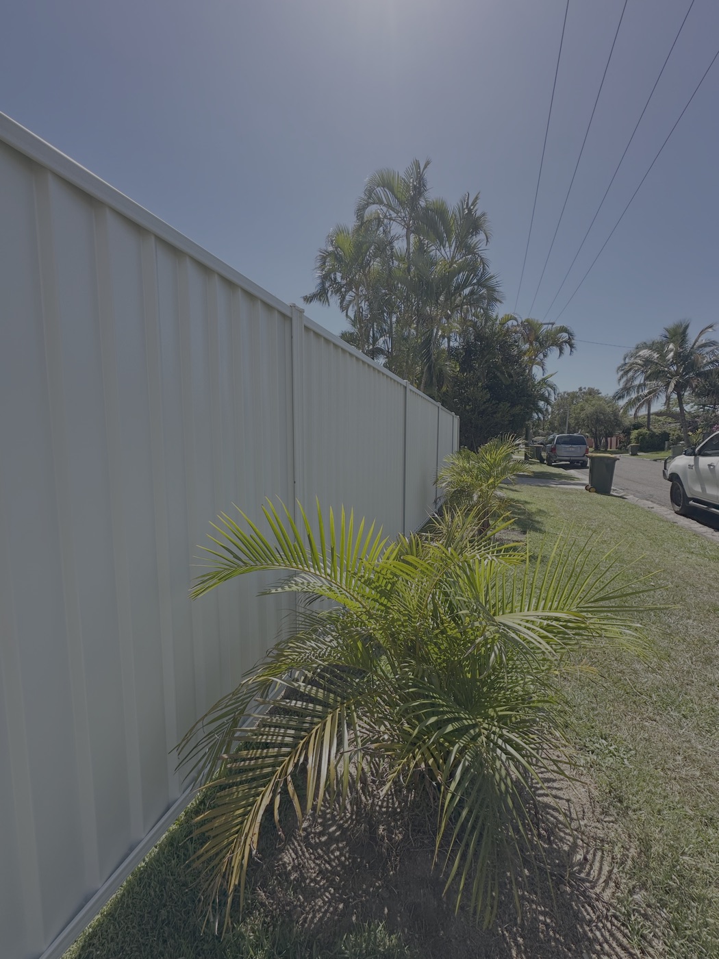 Surfmist Colorbond fence installed in Maroochydore by CoasTrade